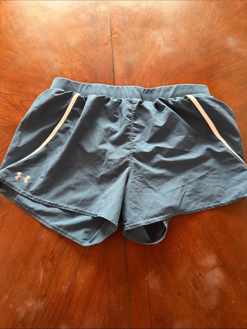 Under Armour Woman’s Blue Athletic Shorts with White Trim